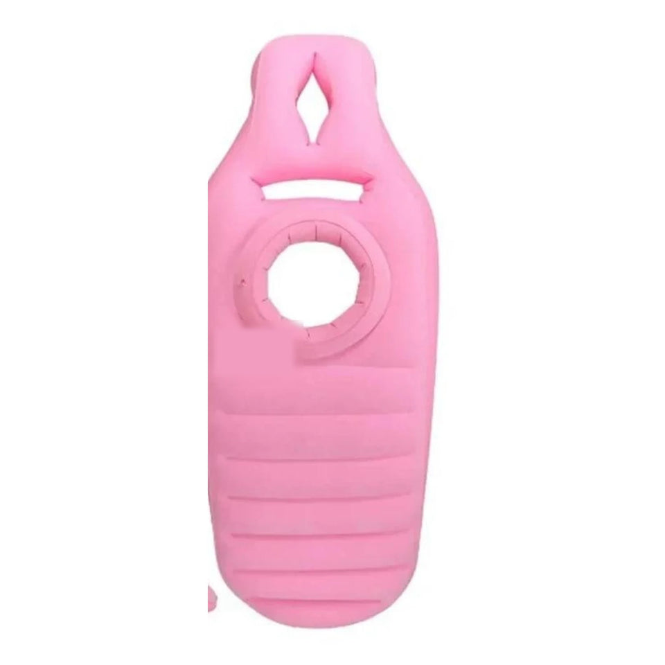 The Bump Lounger pink inflatable pregnancy lounger, real product photo on a white background